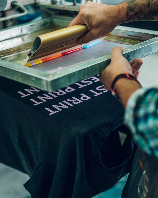 Screen printing in progress at The Marketer Co